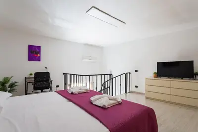 Letto o letti in una camera di Covino House by Dimorra