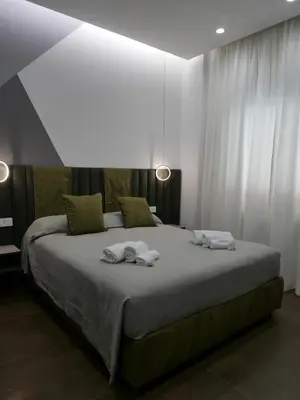 Letto o letti in una camera di Re Lazzarone Suite