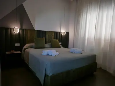 Letto o letti in una camera di Re Lazzarone Suite