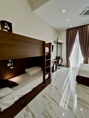 Letto o letti in una camera di AuRoom