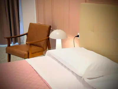 Letto o letti in una camera di Incoming Municipio