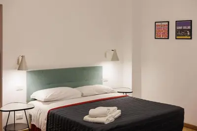 Letto o letti in una camera di Dante Apartament for Group and Family By HouseinNaples