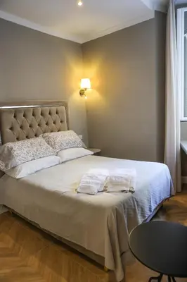 Letto o letti in una camera di Salvator Rooms