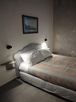 Letto o letti in una camera di Casa Pupetta