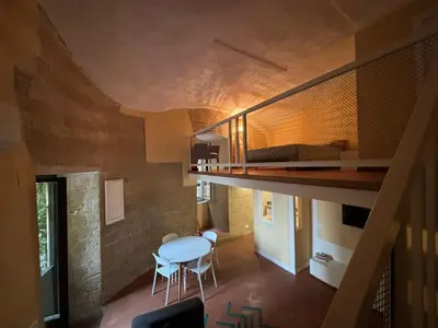 Letto o letti in una camera di La casa nel tufo