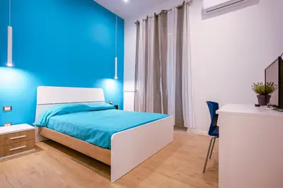 Letto o letti in una camera di Song House Apartment centro storico 7 pax