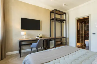Letto o letti in una camera di Boemì smart suites