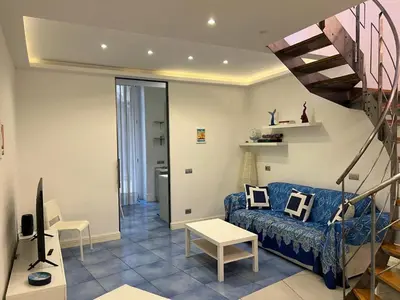 Area soggiorno di DEA Plebiscito - Donna Elena Apartment Plebiscito
