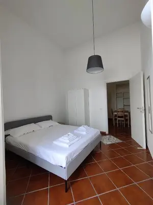 Letto o letti in una camera di Casa Alighieri