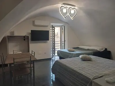 Letto o letti in una camera di Casa Vacanza Annamaria