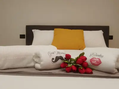 Letto o letti in una camera di Sweet Rooms San Francesco