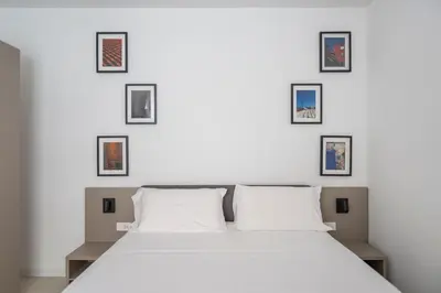Letto o letti in una camera di Palazzo Santa Maria