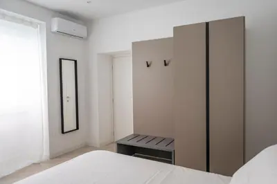 Letto o letti in una camera di Palazzo Santa Maria