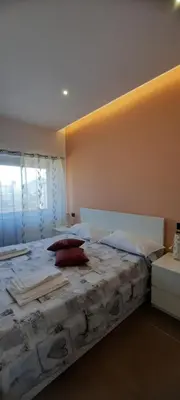 Letto o letti in una camera di B&B Locanda Mediterranea