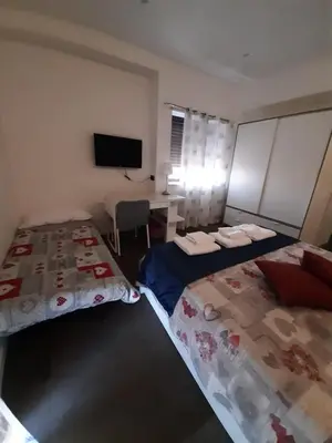 Letto o letti in una camera di B&B Locanda Mediterranea