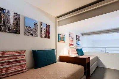 Letto o letti in una camera di Lo Studio, Napoli
