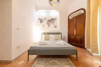 Letto o letti in una camera di Calaba Centro