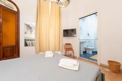 Letto o letti in una camera di Calaba Centro