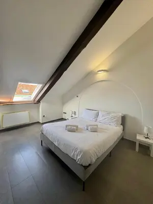 Letto o letti in una camera di Duomo Luxury Loft in the historic Center