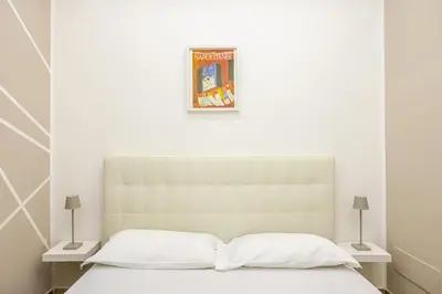 Letto o letti in una camera di Nalusa Superior Chiaia - nel cuore della citta