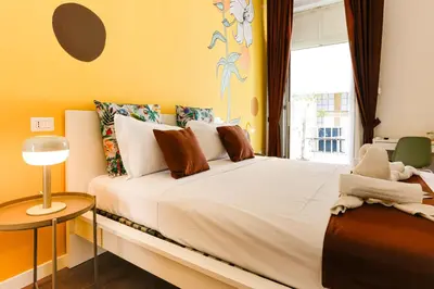 Letto o letti in una camera di Santa Patrizia a Chiaia Apartment