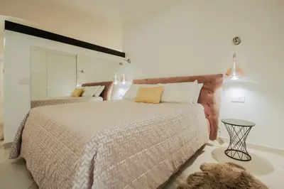 Letto o letti in una camera di Dolce Vita Luxury