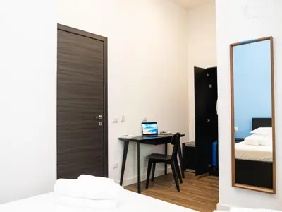 Letto o letti in una camera di Sibilla Guest House & Charme