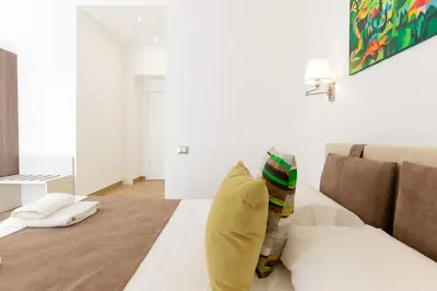 Letto o letti in una camera di Pessina 90 Rooms