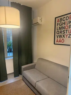 Area soggiorno di HV Suites DECUMANUS