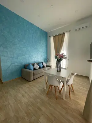 Area soggiorno di Duomo Luxury Apartament