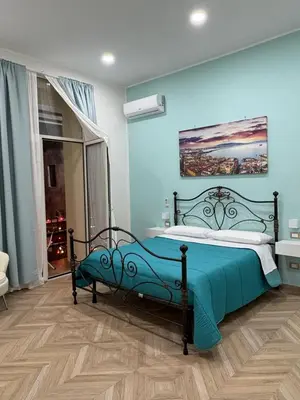 Letto o letti in una camera di A casa re nonni