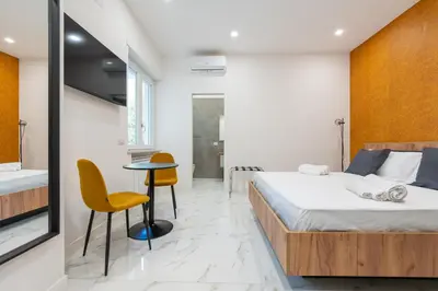 Letto o letti in una camera di Atmosphera rooms