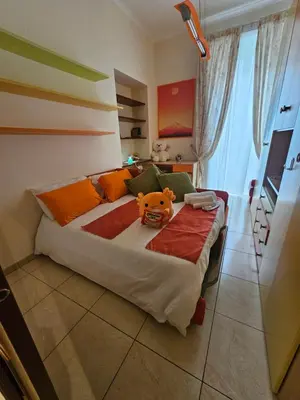 Letto o letti in una camera di Vomero Inn