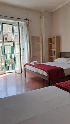 Letto o letti in una camera di Trinita' Maggiore Home/ Historic Center