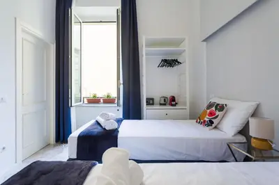 Letto o letti in una camera di Casa Mancini By DomusExtra