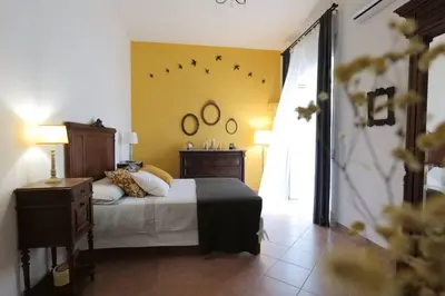 Letto o letti in una camera di Il tempo ritrovato Casa Vacanze