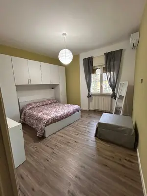 Letto o letti in una camera di Nel cuore di Napoli