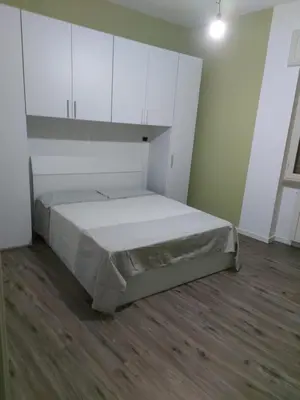 Letto o letti in una camera di Nel cuore di Napoli
