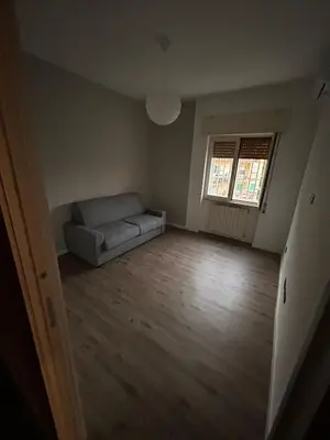 Letto o letti in una camera di Nel cuore di Napoli