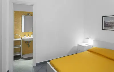 Letto o letti in una camera di Bed & Breakfast Nilo32