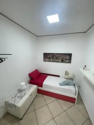Letto o letti in una camera di Annarella Home