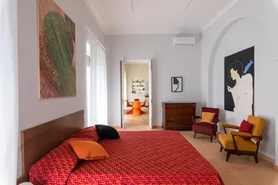 Letto o letti in una camera di Casa Ambra Contemporary Art