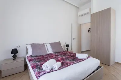 Letto o letti in una camera di Seaside Apartment by Dimorra