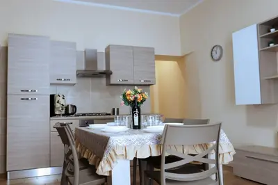 Cucina o angolo cottura di L'Oasi del Re - Apartment