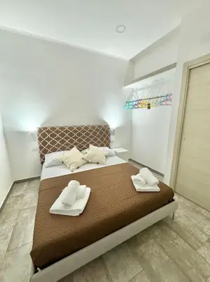 Letto o letti in una camera di Ilarys home