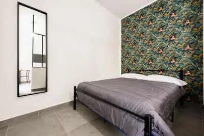 Letto o letti in una camera di Apartment in Sanità Historic District