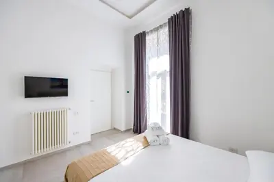 Letto o letti in una camera di Maison Emanuele Double Apartment