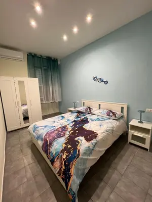 Letto o letti in una camera di Ancora D'Oro