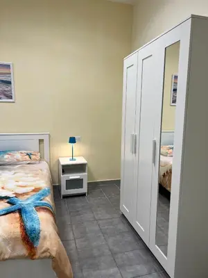 Letto o letti in una camera di Ancora D'Oro