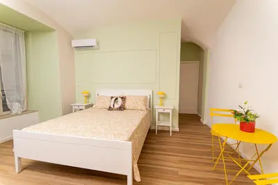 Letto o letti in una camera di Casa Megaride